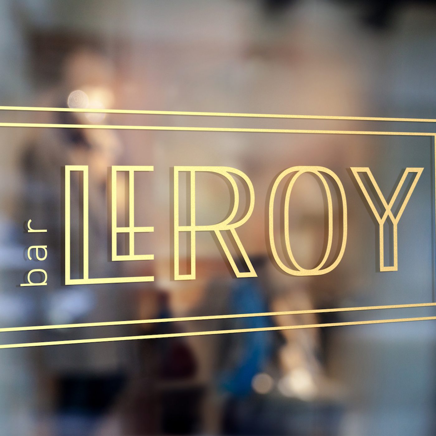 Bar Leroy sign Leakey renovation gold text window