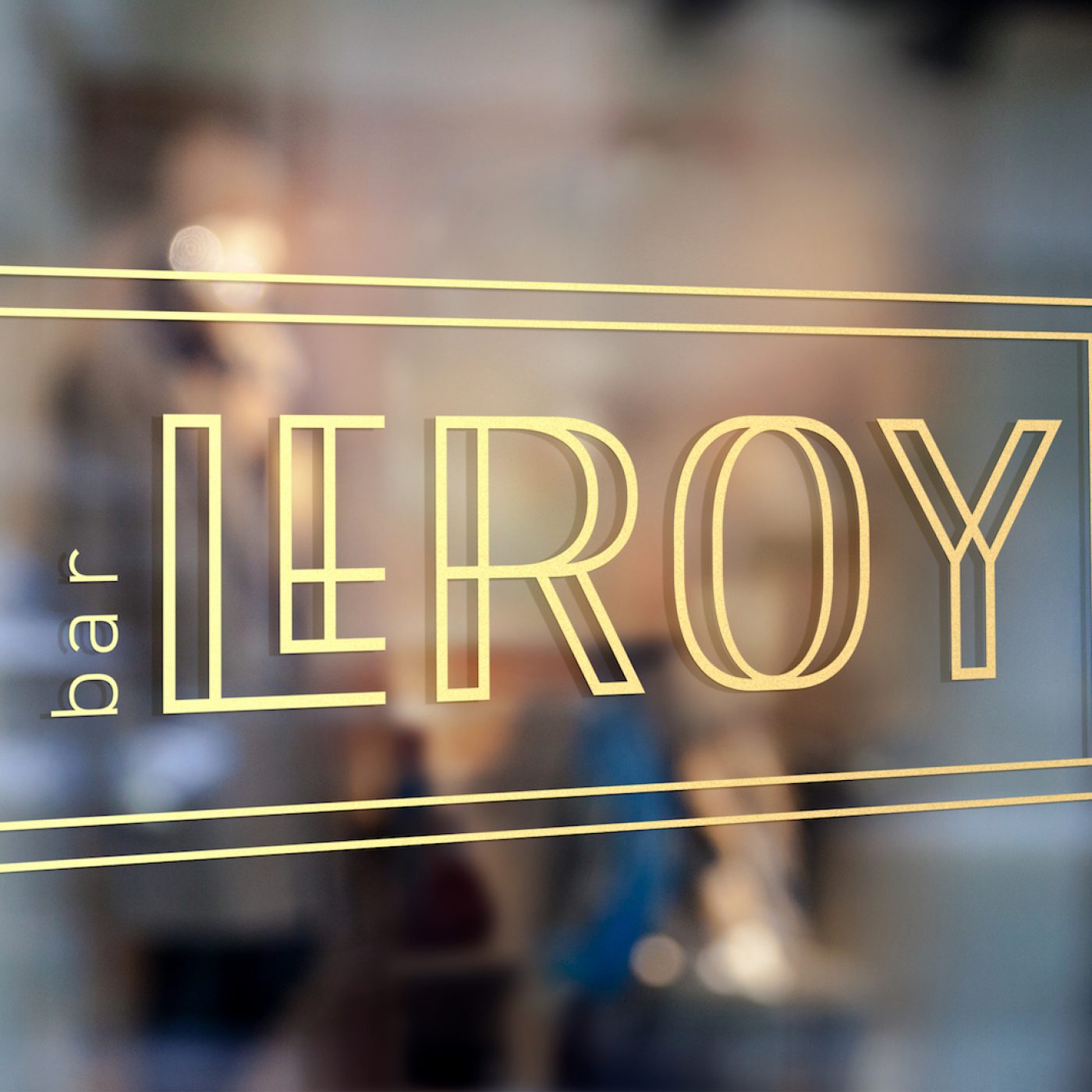 bar-leroy-sign-leakey Bar Leroy sign Leakey renovation gold text window